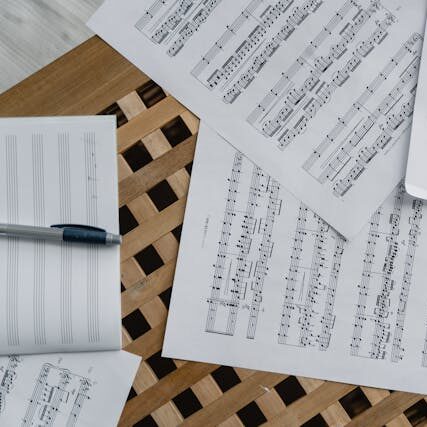 Photo by Tima Miroshnichenko: https://www.pexels.com/photo/sheet-music-on-wooden-surface-6671981/